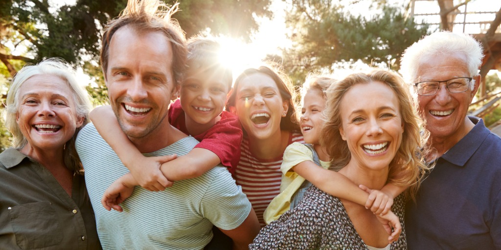 Family outside during sunset